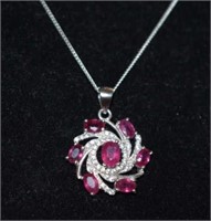 Sterling Silver Pendant w/  Rubies & White Stones