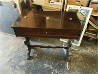 Vintage wooden drop front secretary desk. In use