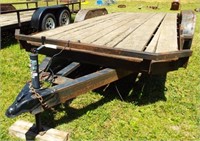16 Ft. flat wood deck dual axel utility trailer.