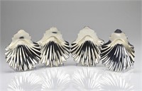 Four George III silver shell dishes