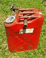 Vintage Jerry gas can with fill nozzle.