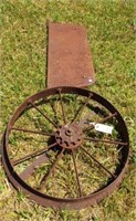 Antique metal spoke wheel.
