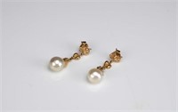 Pair of Secrett gold and pearl earrings