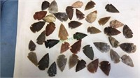 Group of inch and a half arrowheads, (715)