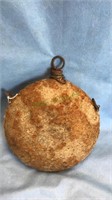 Antique military canteen with a cork stopper,