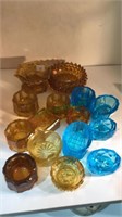 15 blue and Amber salt cellars including to master