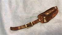 Leather watch fob with a pistol and holster and