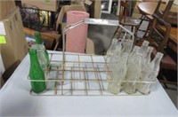Vintage bottle carrier and bottles