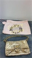 Gold-toned Juicy Couture handbag with dust bag