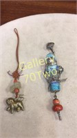 Pair of antique Chinese amulet pendants with