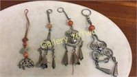 Selection of antique Chinese amulet pendants with