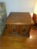 Home decor including and end table cabinet that