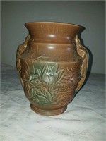 Beautiful vintage vase with water lily embossed