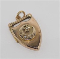 Antique 9ct gold and seed pearl locket