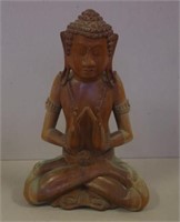 Tibetan carved seated Buddha