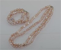 Double strand pink pearl necklace