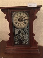 Mantel clock by Waterbury.
