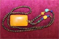 Necklace w/ orange squared pendant