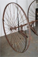 Vintage iron wheels on axle