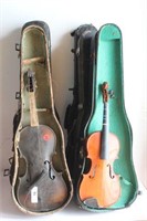 Six Violin Cases and Two Violins