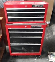 Red Craftsman rolling tool box, contains some