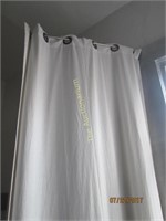 Curtains and curtain hardware in back bedroom