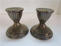 Weighted sterling silver candle sticks