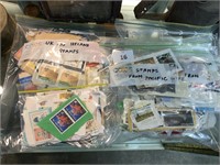7 BAGS OF ASSORTED STAMPS