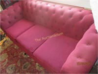 Red Fabric covered sofa