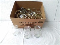 Group of pint canning jars with bands