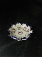 Hand painted blue, white and floral bowl