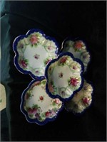 Group of 5 porcelain plates all hand painted