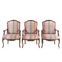 Set of three Rococo style mahogany armchairs