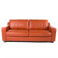 Contemporary burnt orange leather upholstered sofa