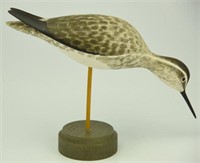 Lot #71 Carved standing Yellow Legs on pedestal