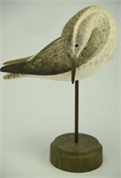 Lot #62 Carved Preening shorebird on pedestal