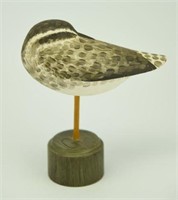 Lot #34 Carved sleeping Plover on pedestal by