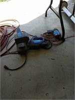 Belt sander drill Skil saw located under table