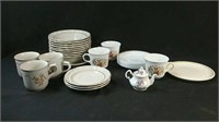 Assorted cups and saucers including some