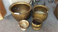 THREE BRASS PLANTERS AND ONE POT WITH HANDLE