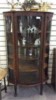 ANTIQUE OAK DISPLAY WITH CURVED GLASS