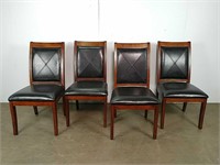 Set if 4 black leather chairs