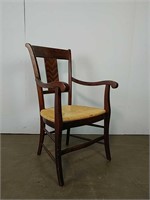 Armchair with wicker seat