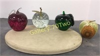 Selection of Apple paperweights-pink art glass is