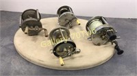 Selection of vintage fishing reels includes South