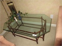 Glass top coffee table with decor