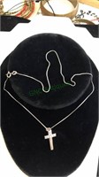 Silver tone necklace with a Silver tone cross with