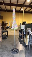 Cast-iron umbrella base with the pole and