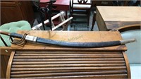 Saber sword with scabbard about 38 inches long,