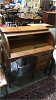 Child's oak Tambour desk, the Tambour door needs